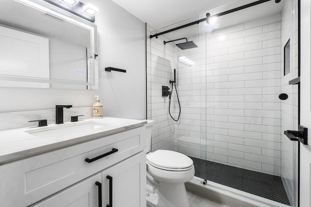 400 Village Green Cir W Unit 310, Palm Springs, FL 33461 - full bath with a stall shower, vanity, toilet, and visible vents