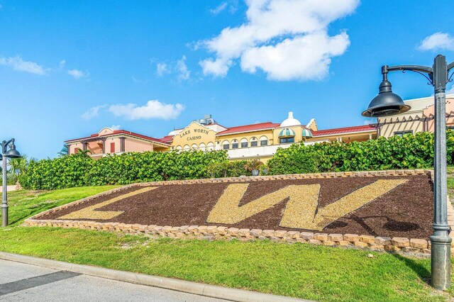 400 Village Green Cir W Unit 310, Palm Springs, FL 33461 - community pool featuring fence