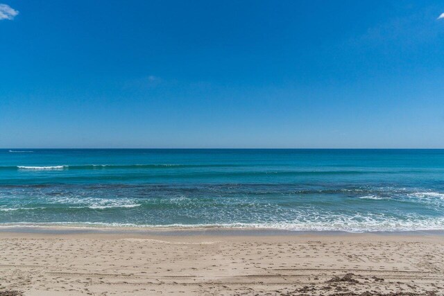 400 Village Green Cir W Unit 310, Palm Springs, FL 33461 - view of water feature with a beach view