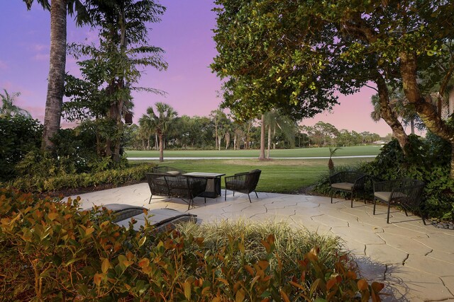 13810 Crosspointe Ct, Palm Beach Gardens, FL 33418 - view of community featuring a lawn and a patio