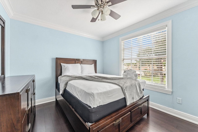 bedroom with dark wood-style flooring, multiple windows, and baseboards