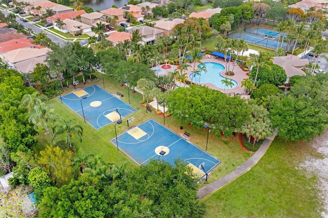 birds eye view of property with a residential view