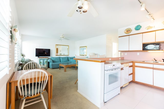 1850 S Ocean Dr Unit 318, Fort Lauderdale, FL 33316 - kitchen featuring a sink, a ceiling fan, electric stove, a peninsula, and white cabinetry