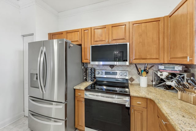 273 River Bluff Ln, Royal Palm Beach, FL 33411 - kitchen with stainless steel appliances, tasteful backsplash, light stone counters, baseboards, and ornamental molding