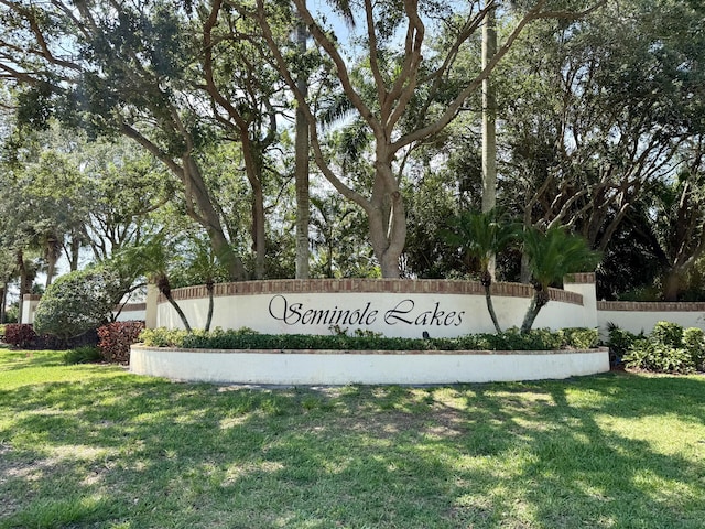 273 River Bluff Ln, Royal Palm Beach, FL 33411 - community sign featuring a lawn