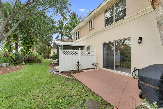 273 River Bluff Ln, Royal Palm Beach, FL 33411 - view of yard with a patio