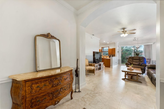 273 River Bluff Ln, Royal Palm Beach, FL 33411 - living area featuring a ceiling fan, arched walkways, ornamental molding, and baseboards