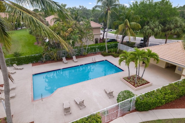 273 River Bluff Ln, Royal Palm Beach, FL 33411 - community pool featuring fence and a patio