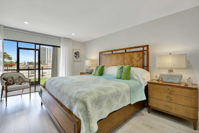 bedroom with access to outside, recessed lighting, and light wood finished floors