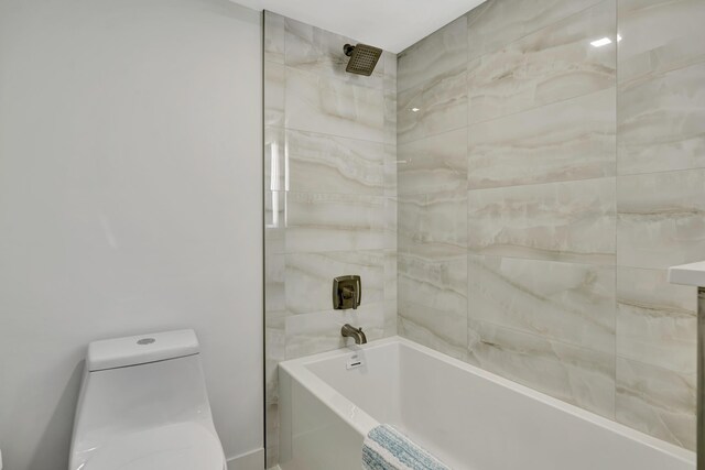 full bathroom featuring toilet