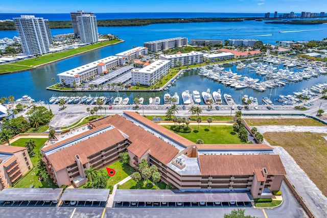 drone / aerial view with a water view and a city view