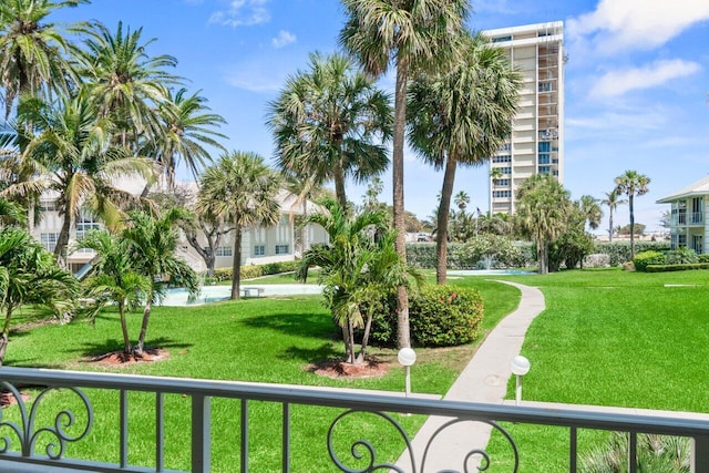 view of community featuring a lawn