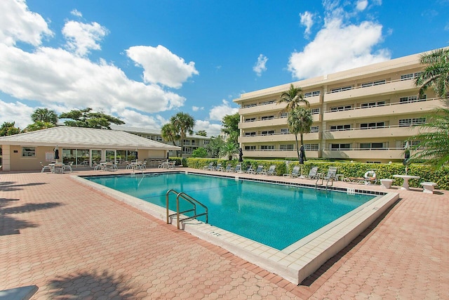 pool with a patio