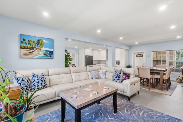 living room featuring recessed lighting
