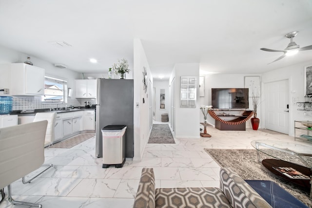 155 N Riomar Dr N, Port Saint Lucie, FL 34952 - living room featuring visible vents, baseboards, a ceiling fan, recessed lighting, and marble finish floor