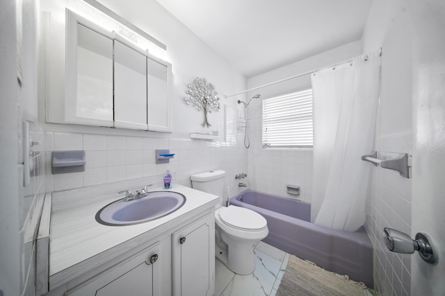 155 N Riomar Dr N, Port Saint Lucie, FL 34952 - bathroom featuring toilet, tile walls, vanity, and shower / bath combination with curtain