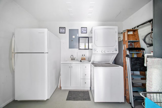 155 N Riomar Dr N, Port Saint Lucie, FL 34952 - laundry room featuring a sink, stacked washer and clothes dryer, and electric panel