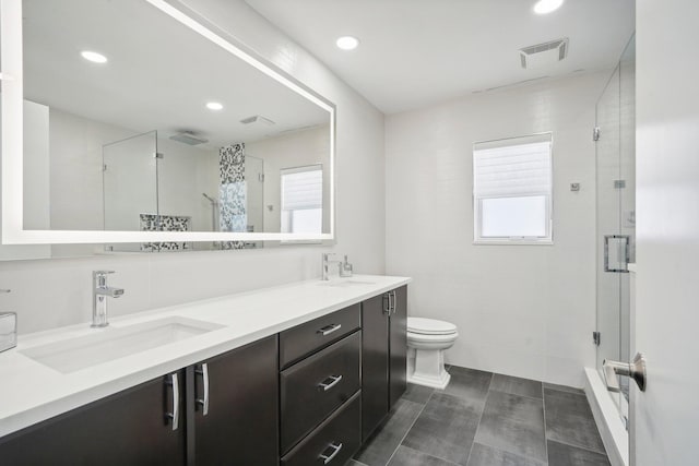 21830 Banyanwood Rd, Boca Raton, FL 33433 - bathroom featuring a sink, visible vents, double vanity, and a stall shower