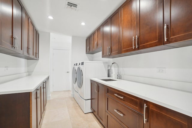 21830 Banyanwood Rd, Boca Raton, FL 33433 - clothes washing area featuring cabinet space, visible vents, recessed lighting, a sink, and washing machine and dryer