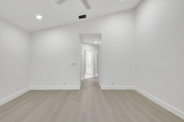 unfurnished room featuring baseboards, a ceiling fan, light wood-style floors, and recessed lighting