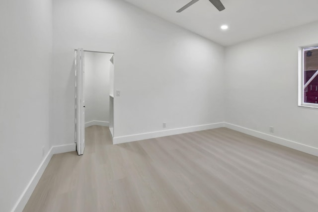 unfurnished room with recessed lighting, light wood-style floors, baseboards, and ceiling fan