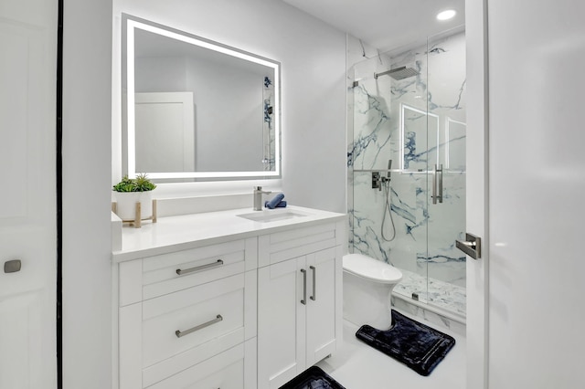 full bath with recessed lighting, toilet, vanity, and a marble finish shower