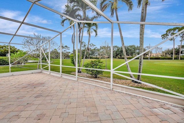 unfurnished sunroom with view of golf course