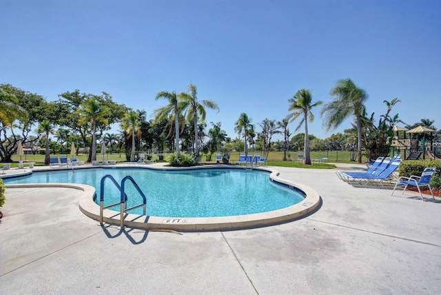 pool with a patio area