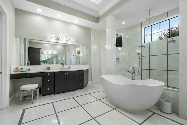 full bathroom with a freestanding tub, vanity, ornamental molding, recessed lighting, and tiled shower