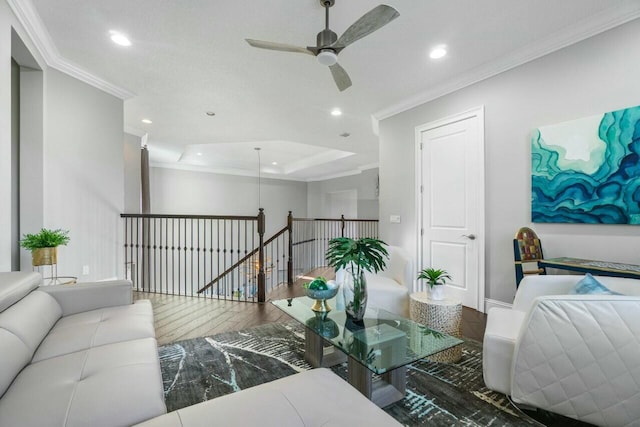 living room featuring recessed lighting, wood finished floors, ornamental molding, and ceiling fan