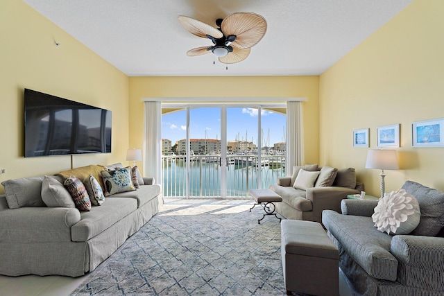living area with ceiling fan