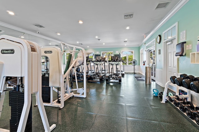 workout area with ornamental molding, visible vents, and recessed lighting