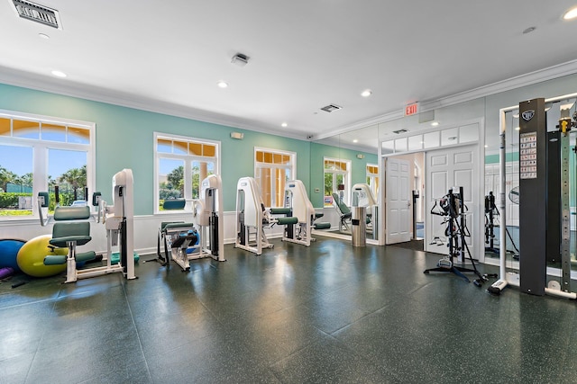 exercise room featuring visible vents, recessed lighting, and crown molding