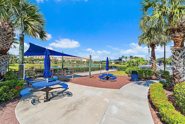 exterior space with a water view