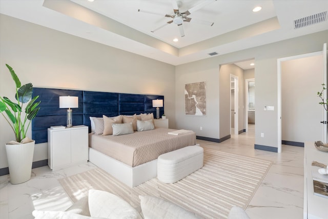 bedroom featuring recessed lighting, baseboards, light marble finish floors, a raised ceiling, and a ceiling fan
