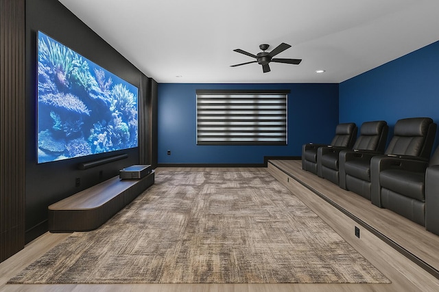 home theater room featuring ceiling fan