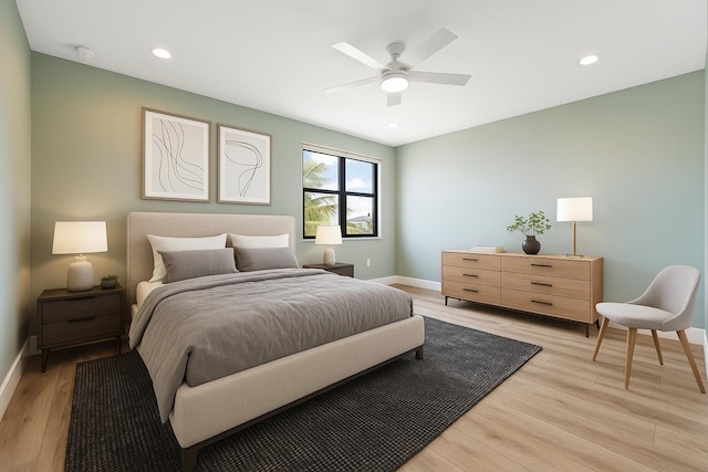 bedroom with baseboards, light wood finished floors, ceiling fan, and recessed lighting