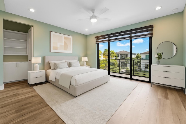 bedroom with access to exterior, light wood finished floors, recessed lighting, and a ceiling fan