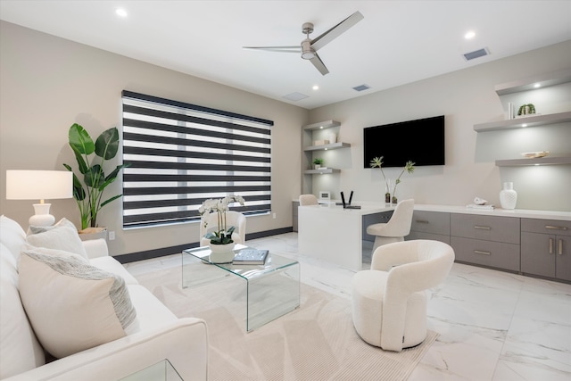 living area with light marble finish flooring, a ceiling fan, and recessed lighting