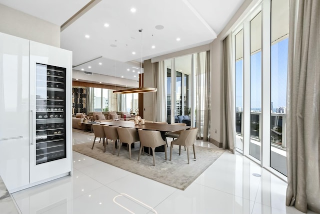 dining area featuring tile patterned floors and visible vents