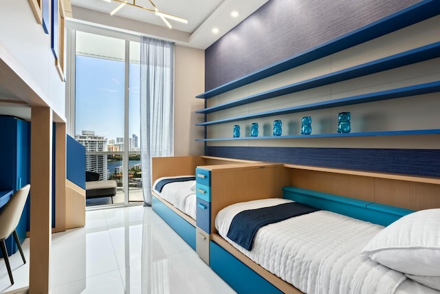 tiled bedroom with a wall of windows, recessed lighting, access to exterior, and a city view