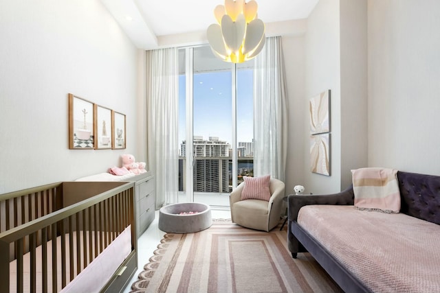 bedroom with a notable chandelier