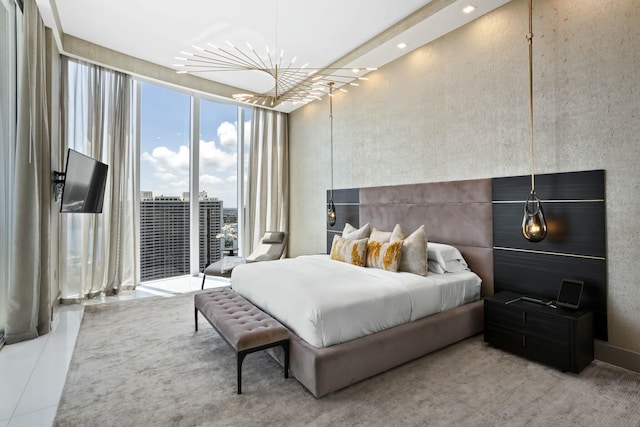 tiled bedroom with access to outside and recessed lighting