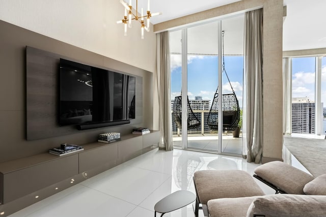 living area with a notable chandelier and tile patterned flooring