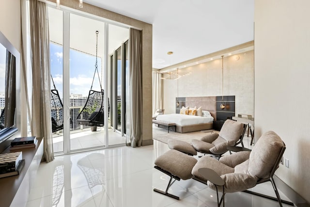 tiled bedroom featuring access to outside