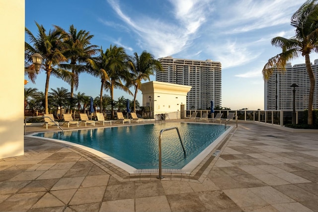 community pool featuring a patio area
