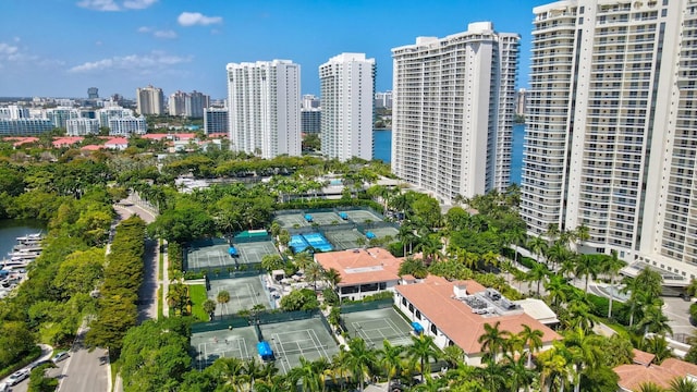 aerial view featuring a water view and a view of city