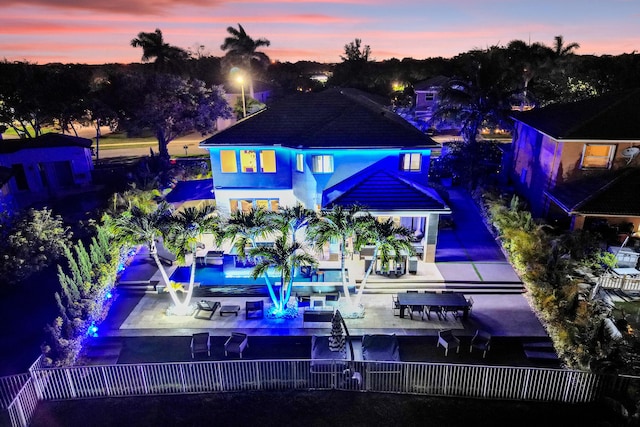 exterior space featuring a patio and a pool