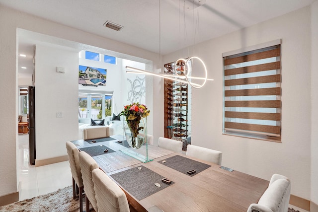 dining space featuring visible vents