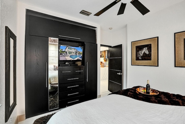 bedroom featuring visible vents and a ceiling fan